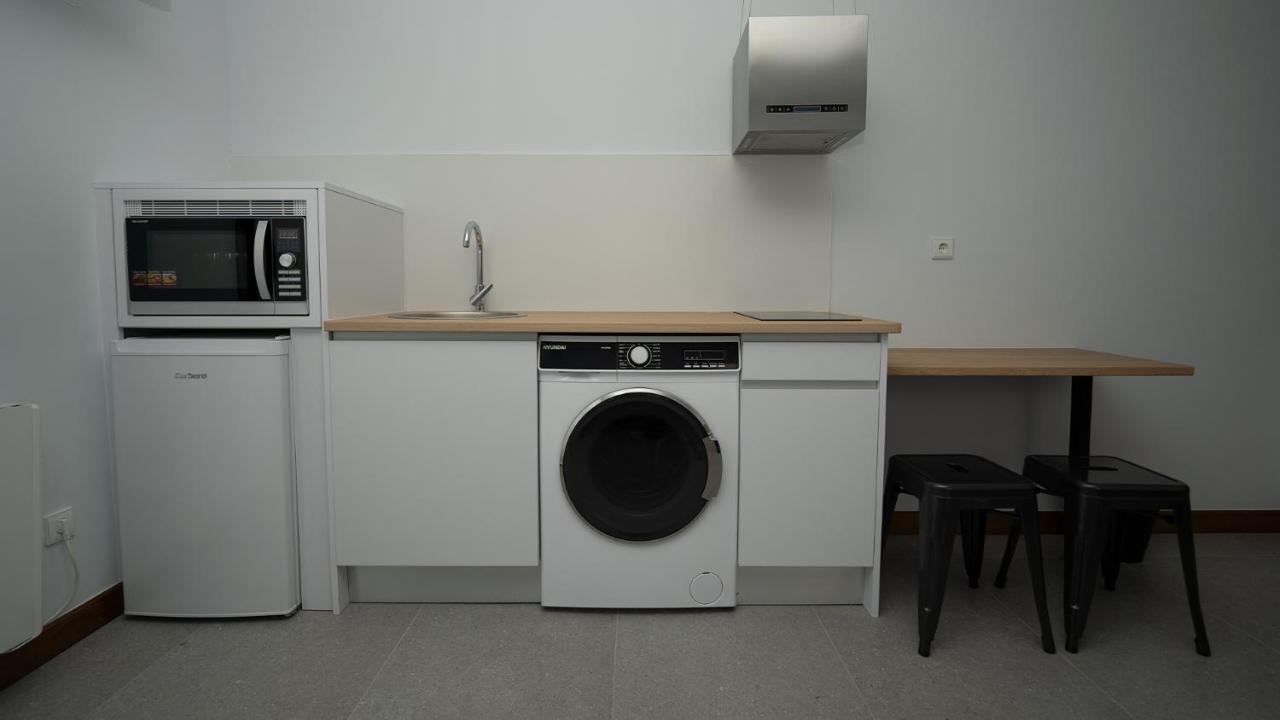 Apartamentos Puerta De Occidente Cornellana Esterno foto